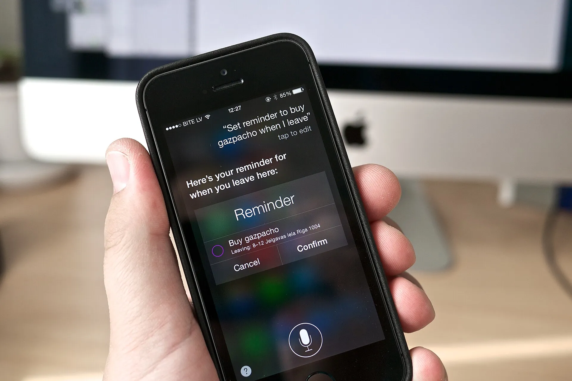 An iPhone screen displaying the Siri voice assistant interface.