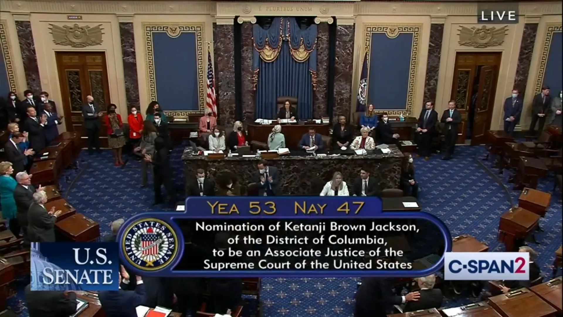 Senators fill the U.S. Senate chamber floor during a roll call vote, with the presiding officer's rostrum visible at center