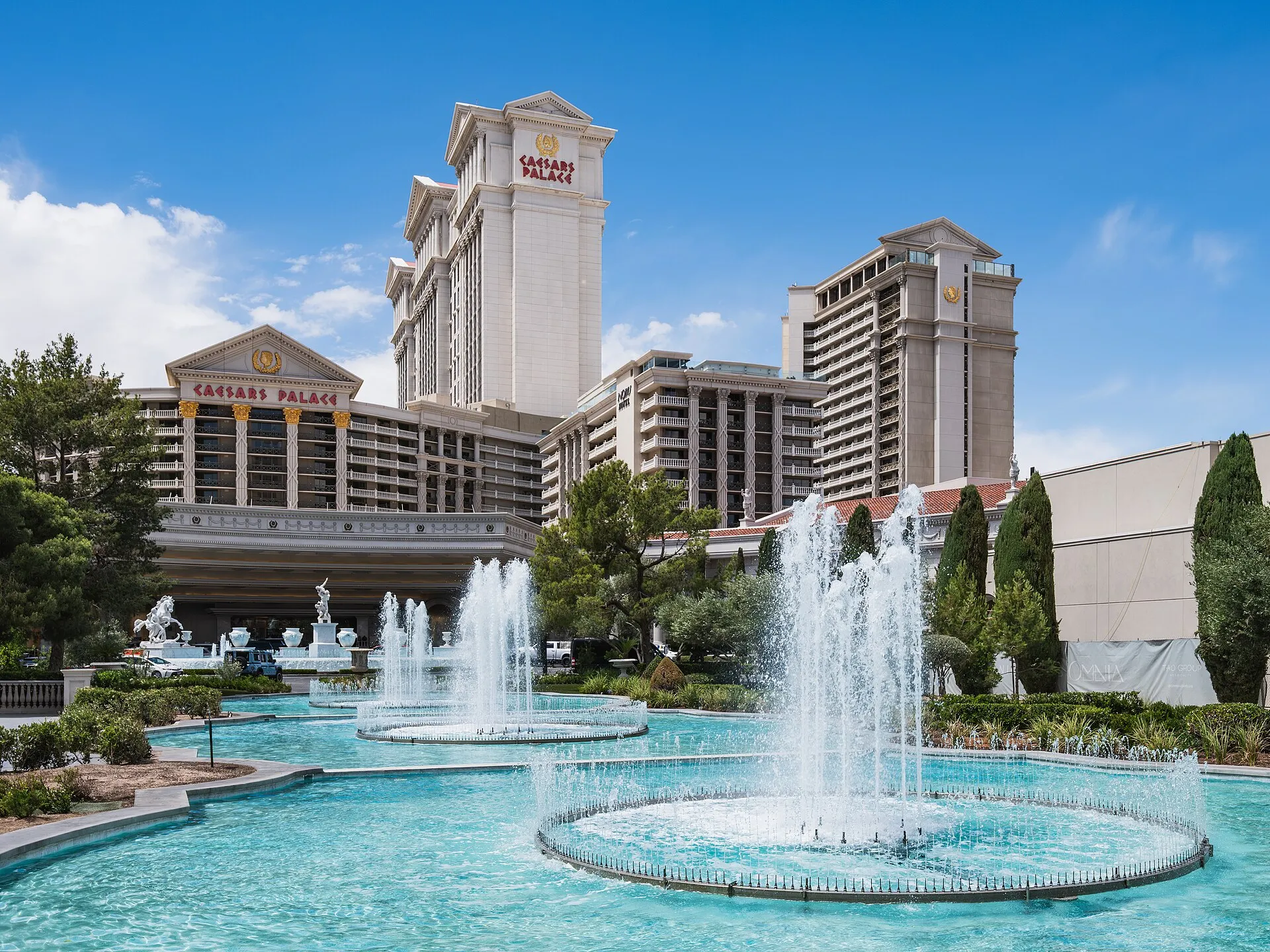 The Caesars Palace hotel and casino seen from Las Vegas Boulevard with its fountains in the foreground.