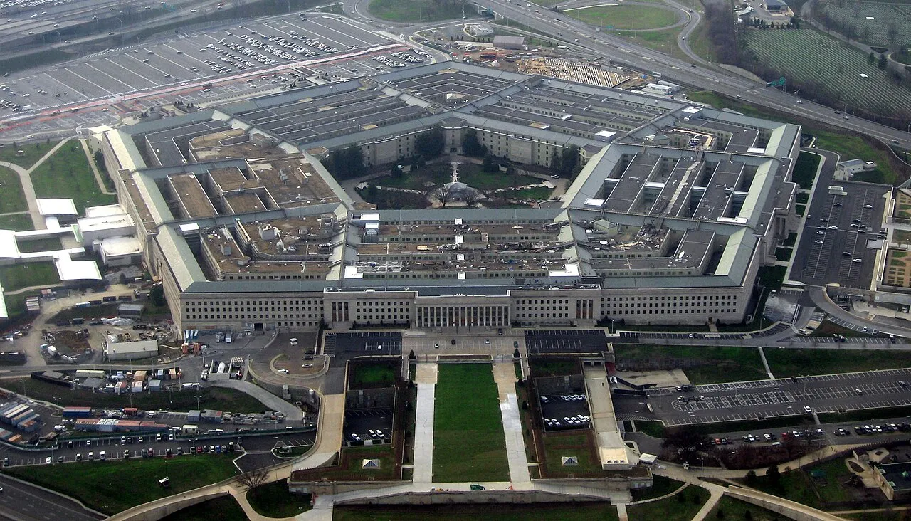 Aerial view of the Pentagon building in Arlington, Virginia, surrounded by parking lots and highways