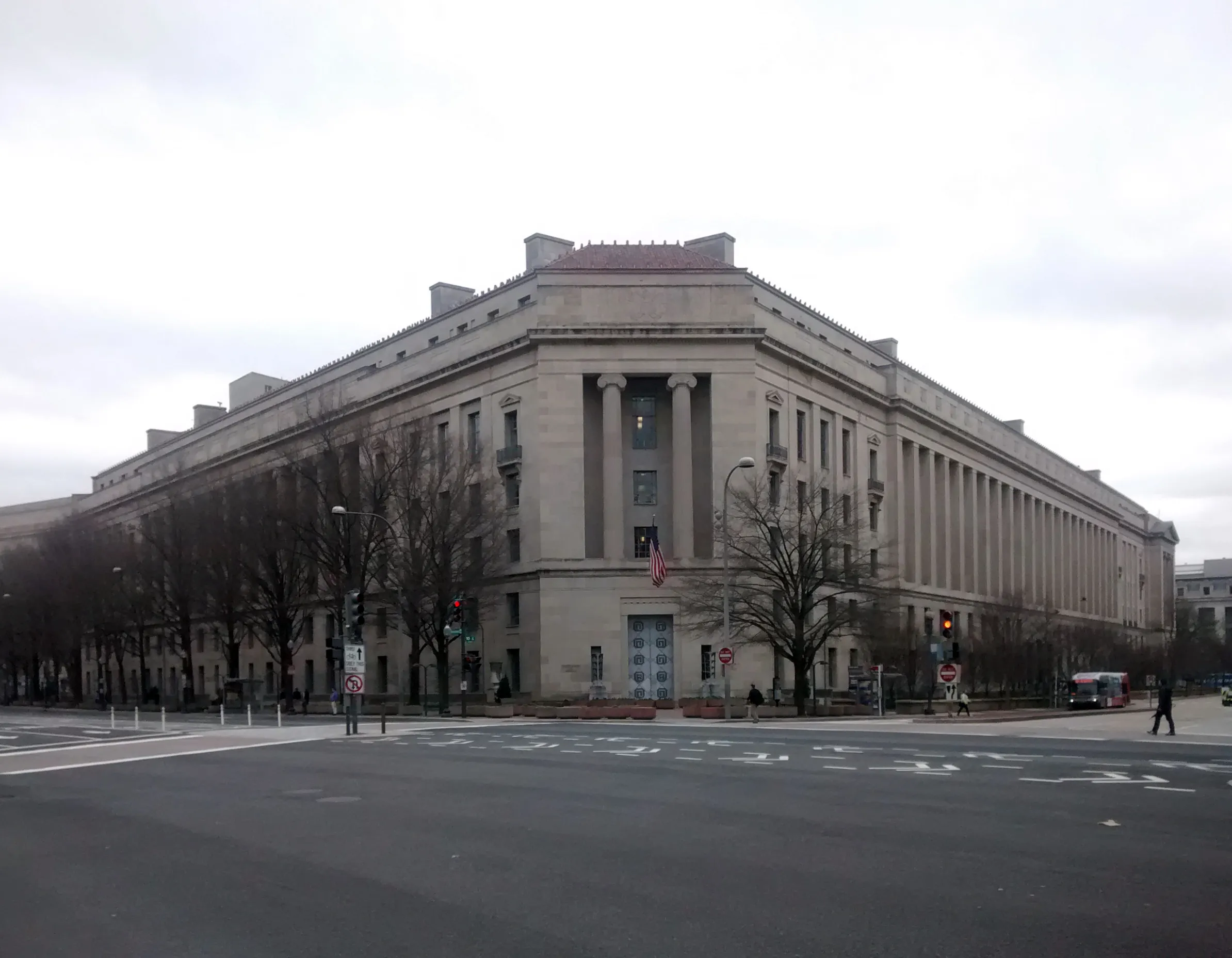 The stone facade and columns of the Robert F. Kennedy Department of Justice Building in Washington, D.C.