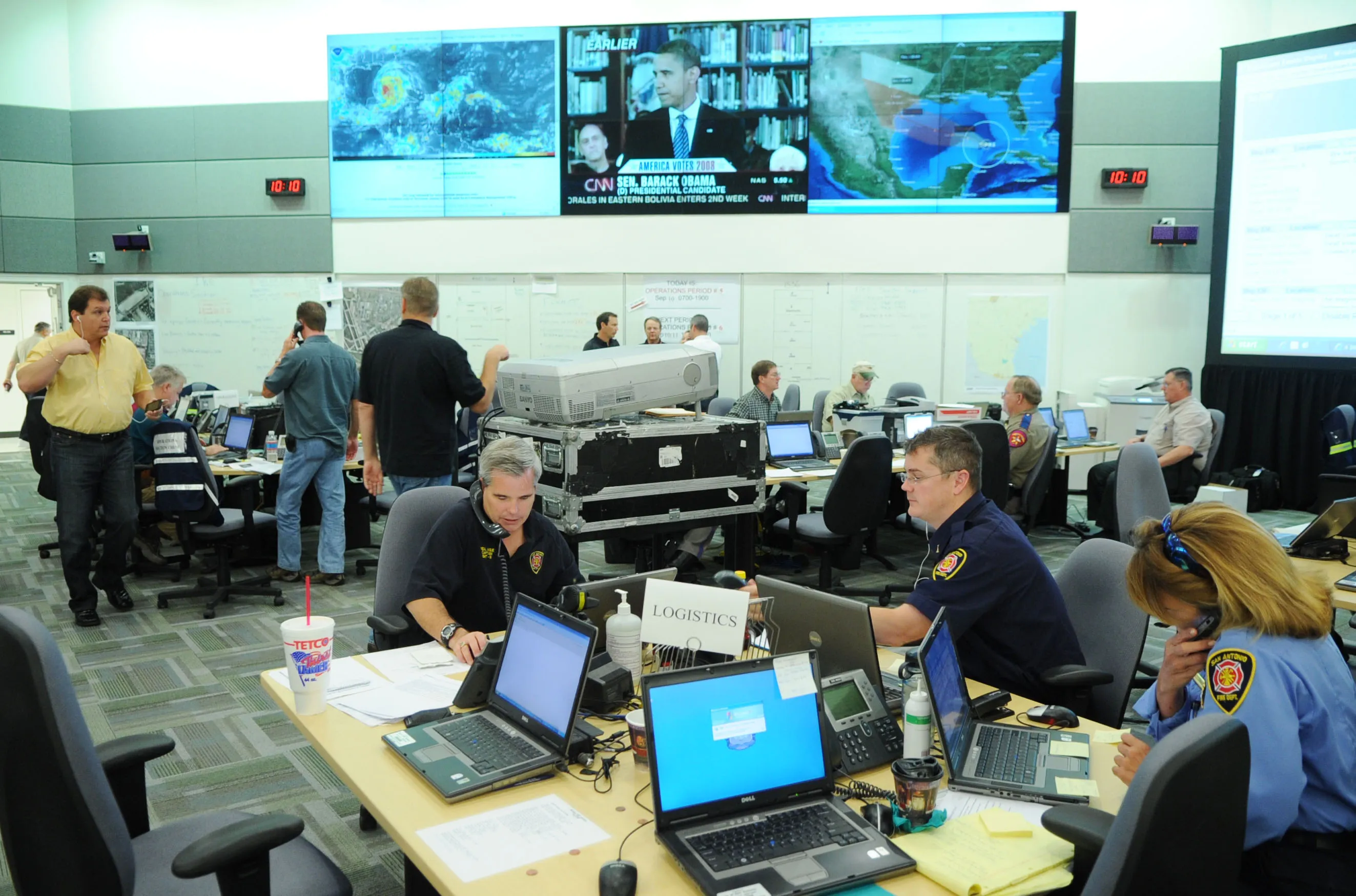 FEMA and county emergency officials work at computers inside a Texas EOC preparing for Hurricane Ike, September 2008.