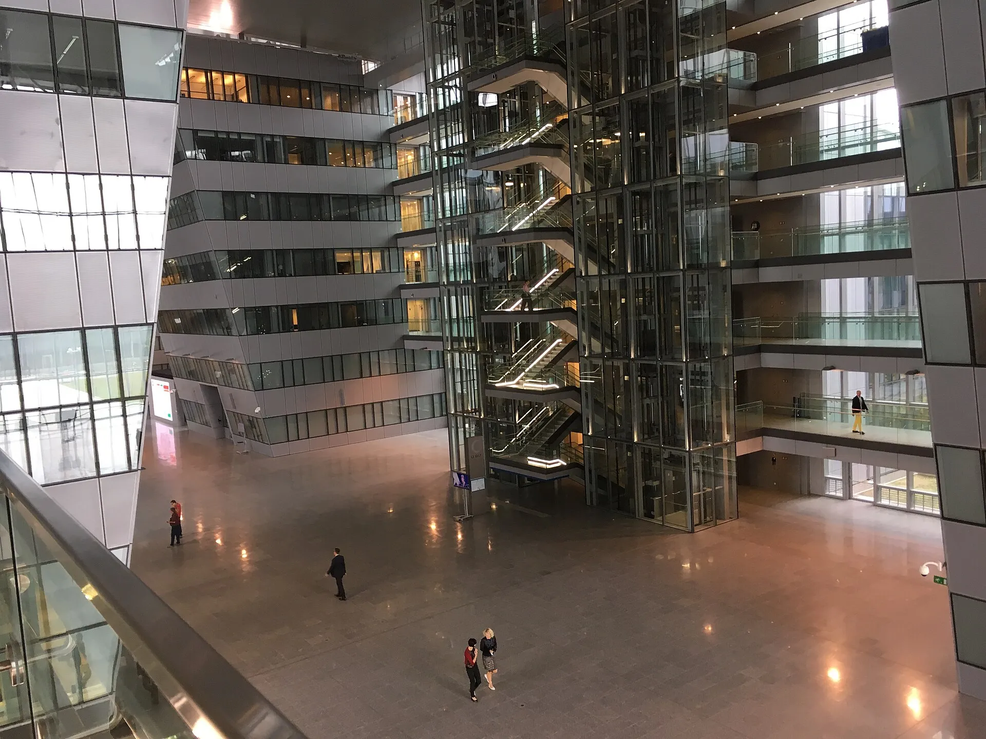 The modern glass-and-steel NATO headquarters building in Brussels, Belgium.