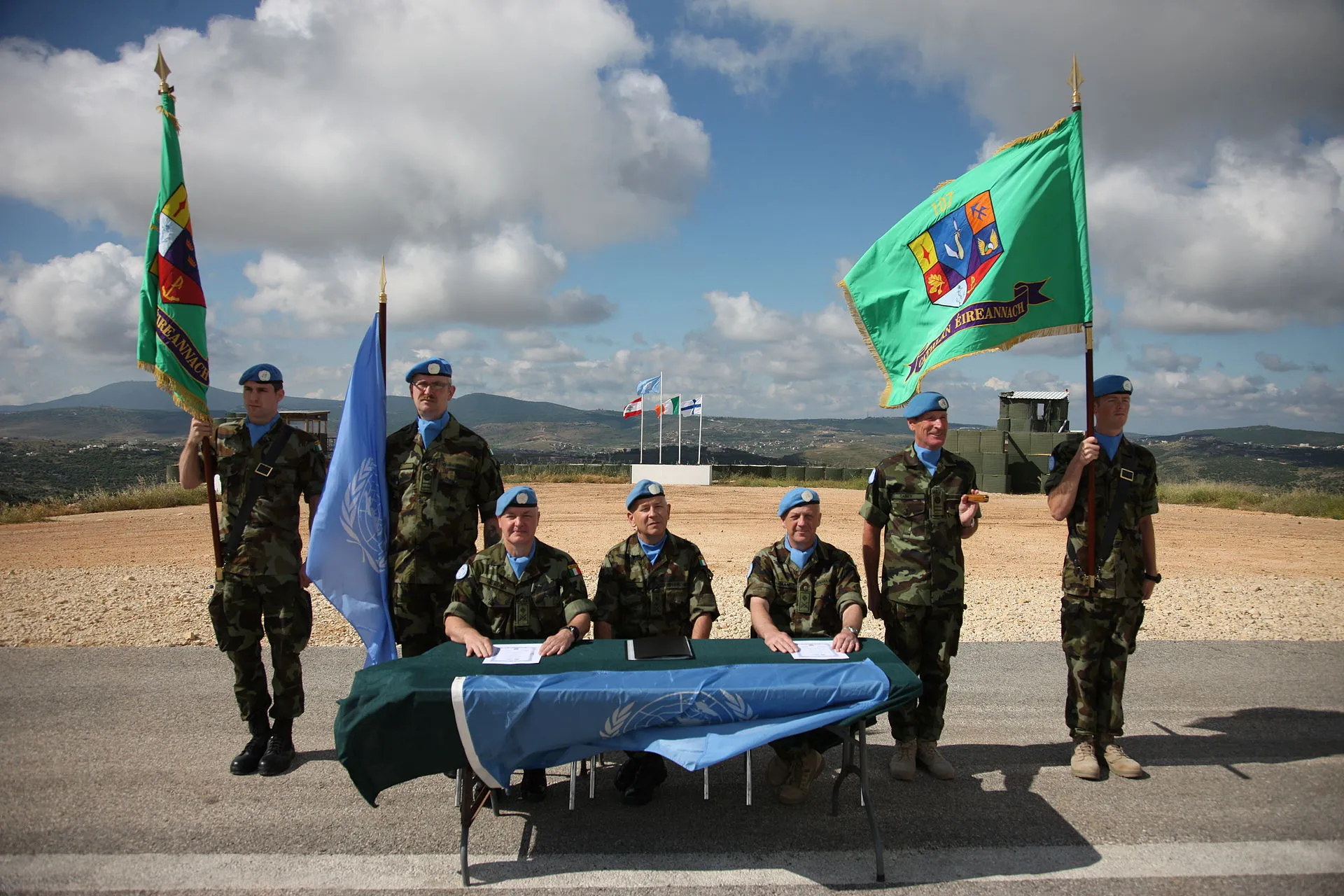 United Nations peacekeepers in uniform stand in formation during a UNIFIL ceremony in southern Lebanon.