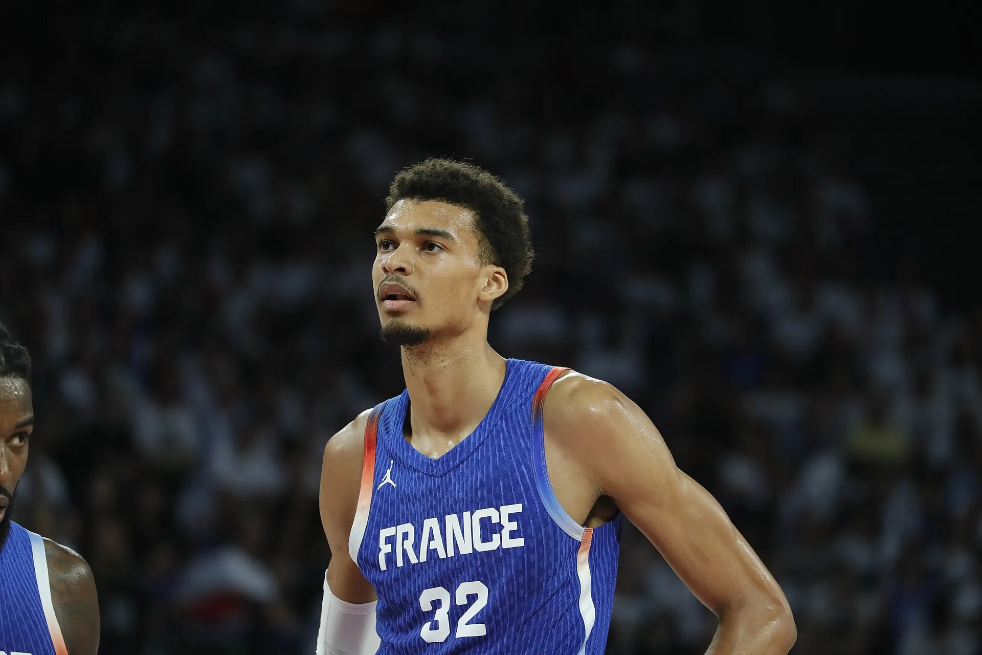 Victor Wembanyama in an attacking move during a basketball game for the French national team