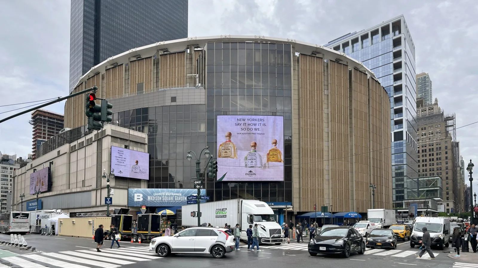 Madison Square Garden exterior viewed from the street on a clear day, with the arena marquee visible.