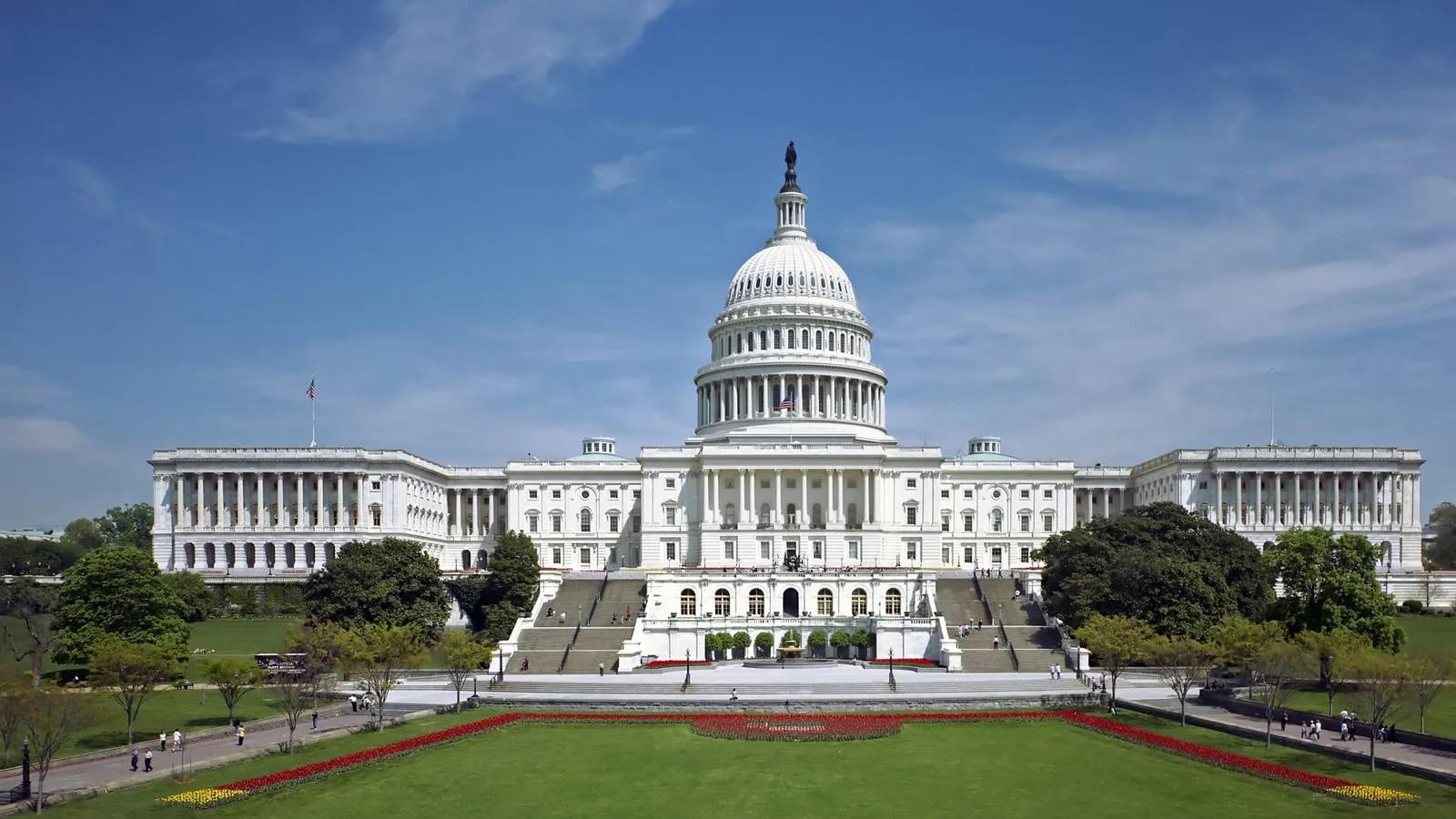The United States Capitol building seen from the west front, with the Statue of Freedom atop the dome.