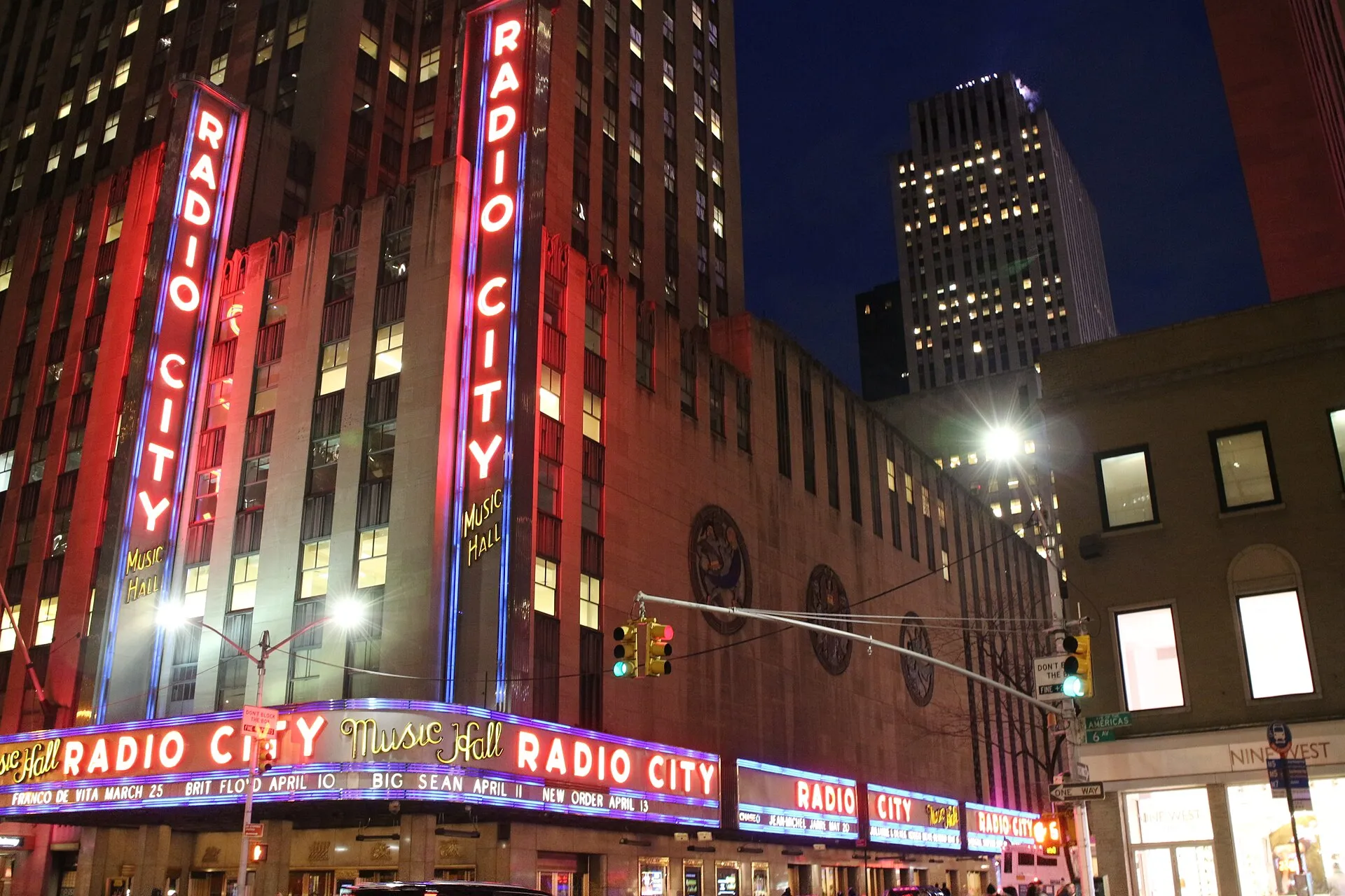 The Art Deco exterior and vertical marquee of Radio City Music Hall in Manhattan.