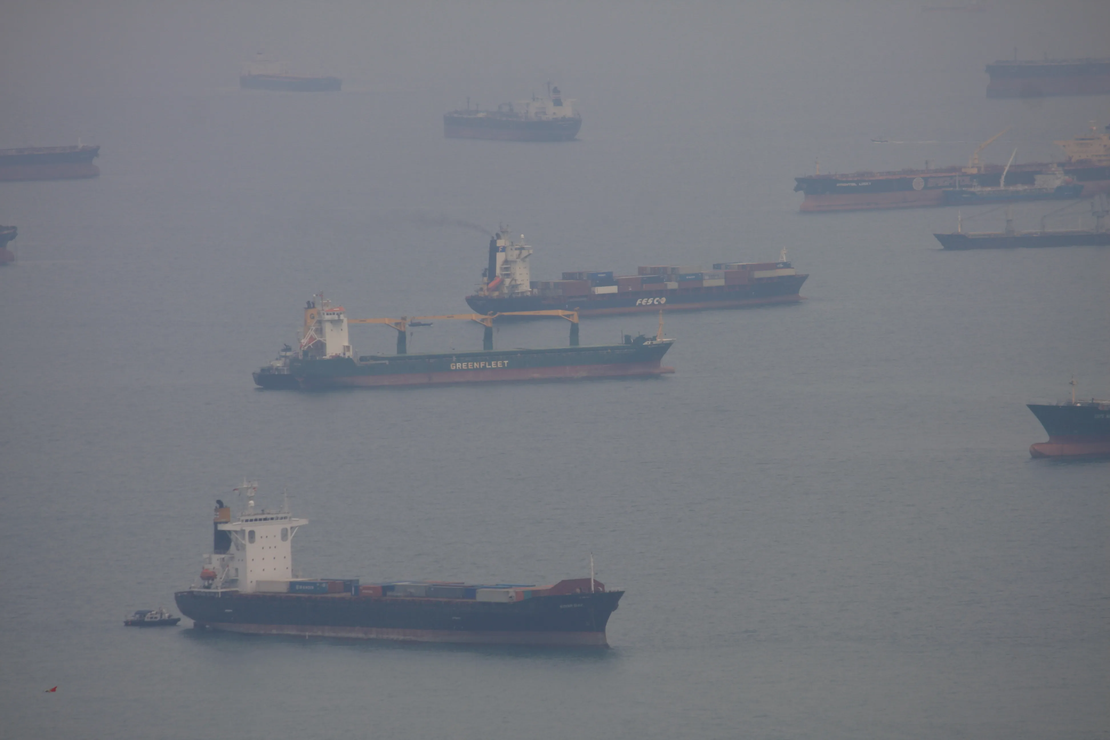 Container ships at anchor off the coast of Singapore