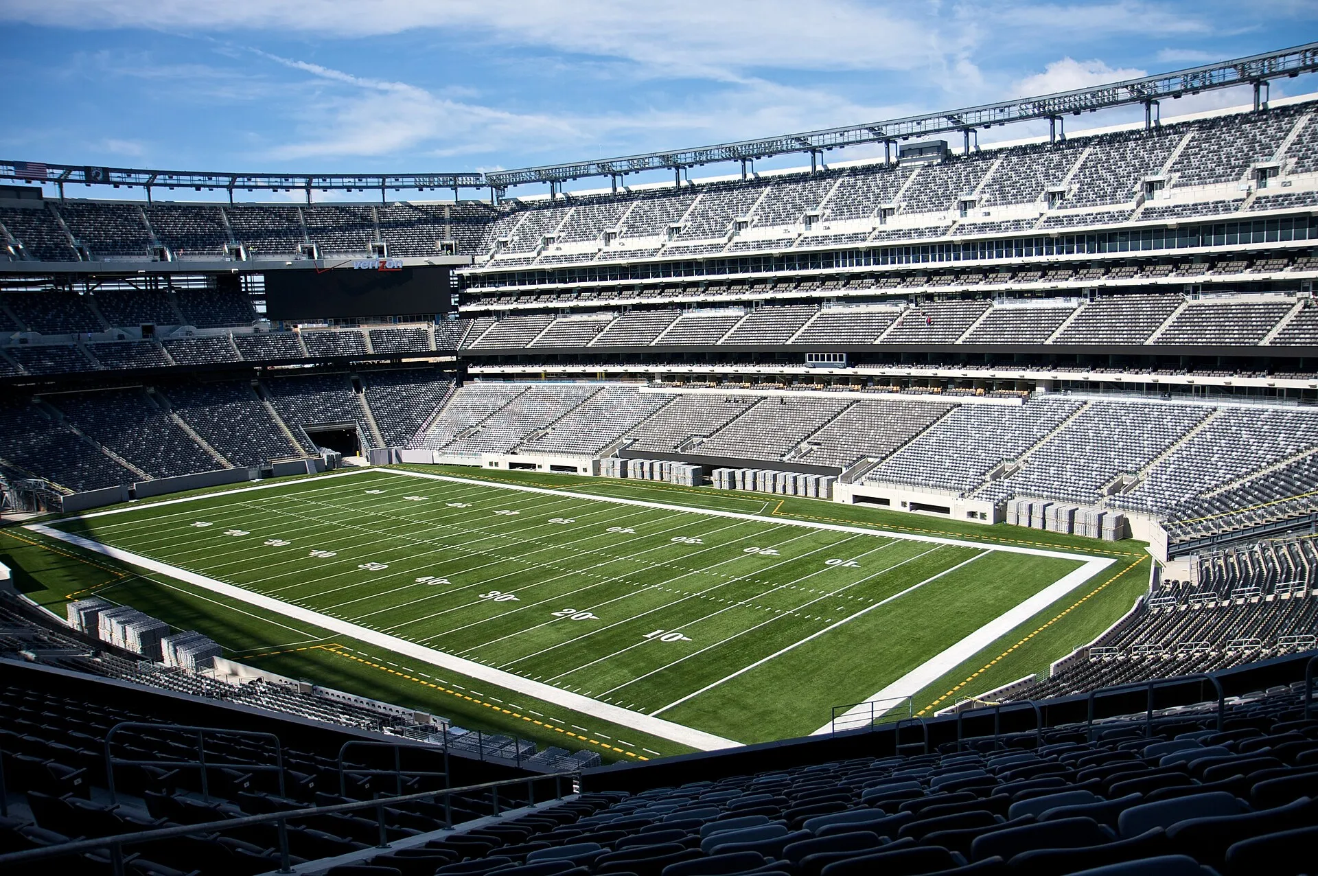Rows of empty tiered seats overlooking the field at MetLife Stadium in East Rutherford, New Jersey